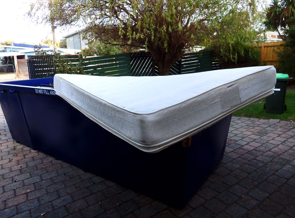 Mattress in skip