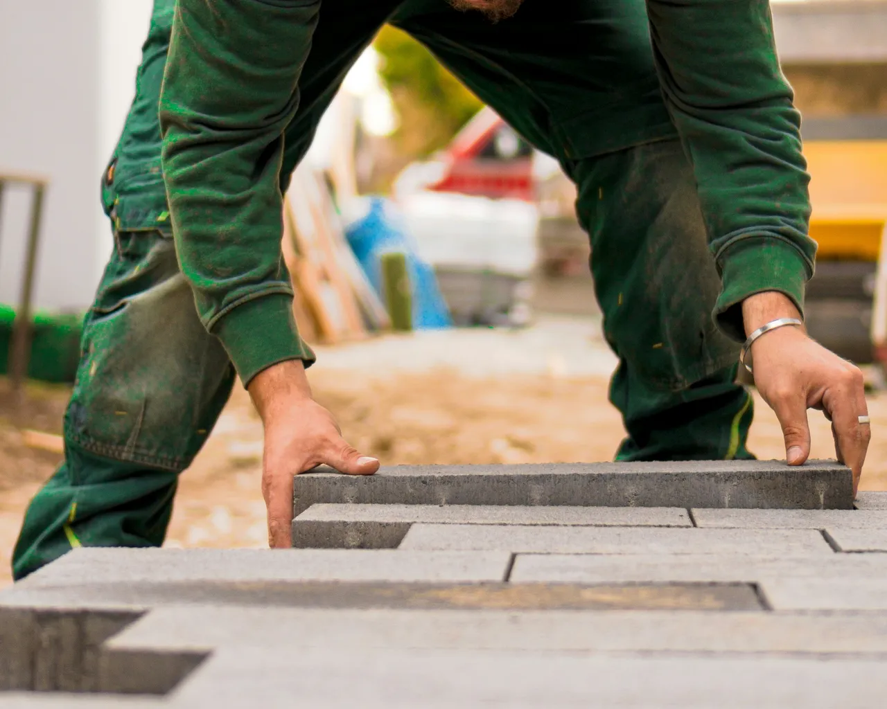 Garden Pathway Being Installed By Worker