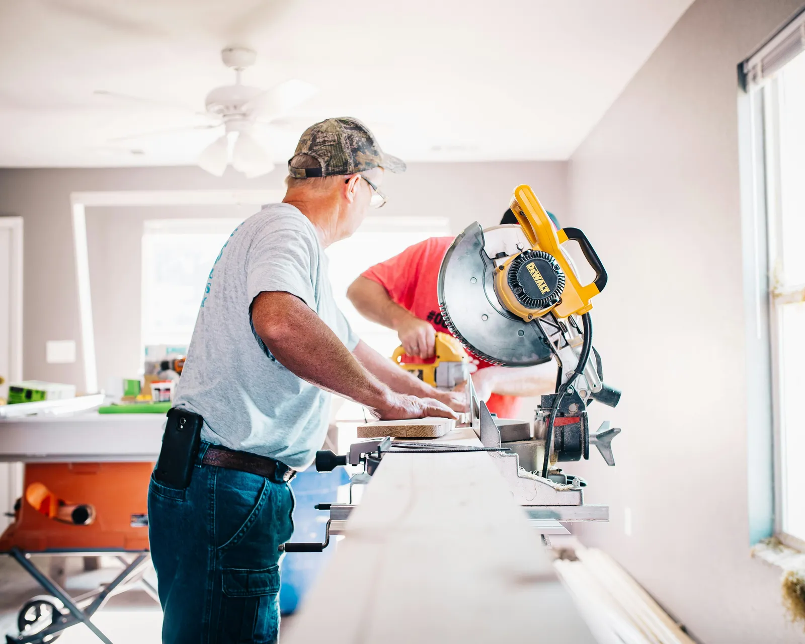 Carpenter Cutting Wood With Circle Saw