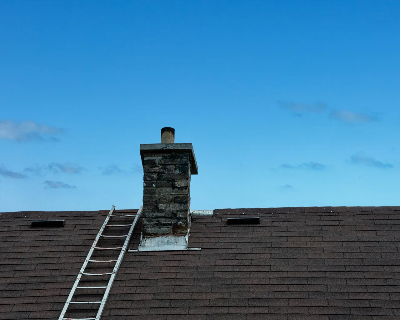 Ladder Leading Up To Chimney