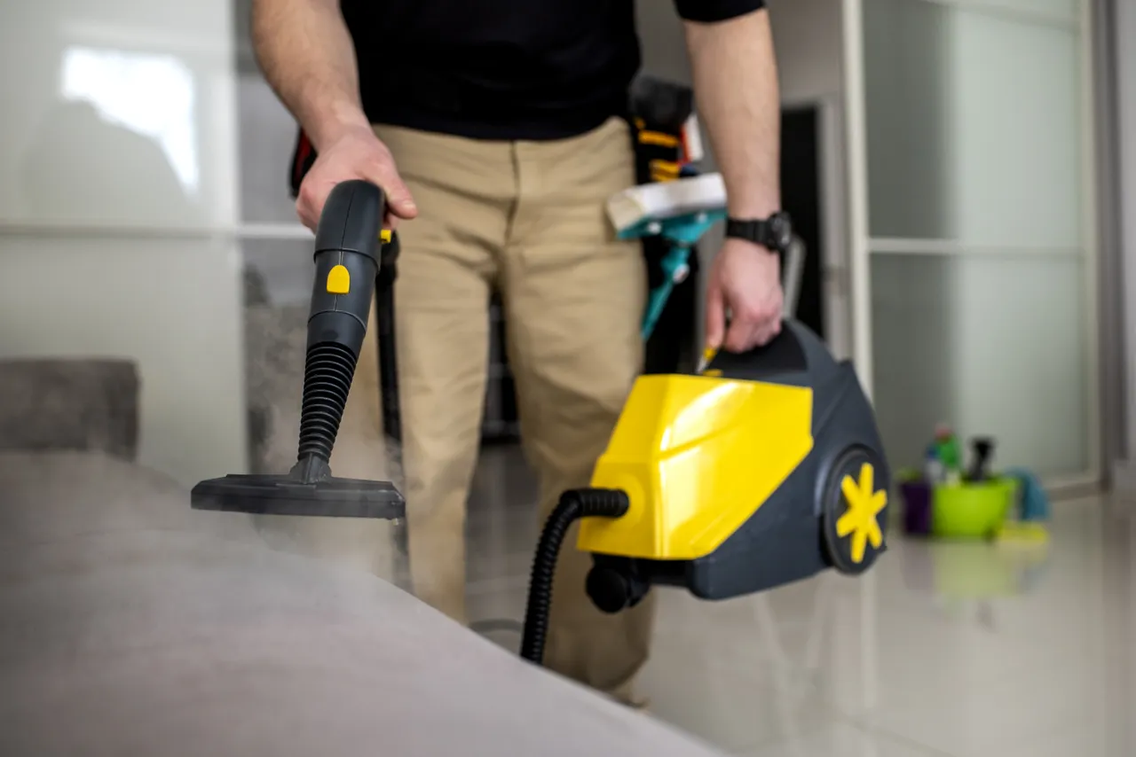 Man Doing Professional Home Cleaning Service