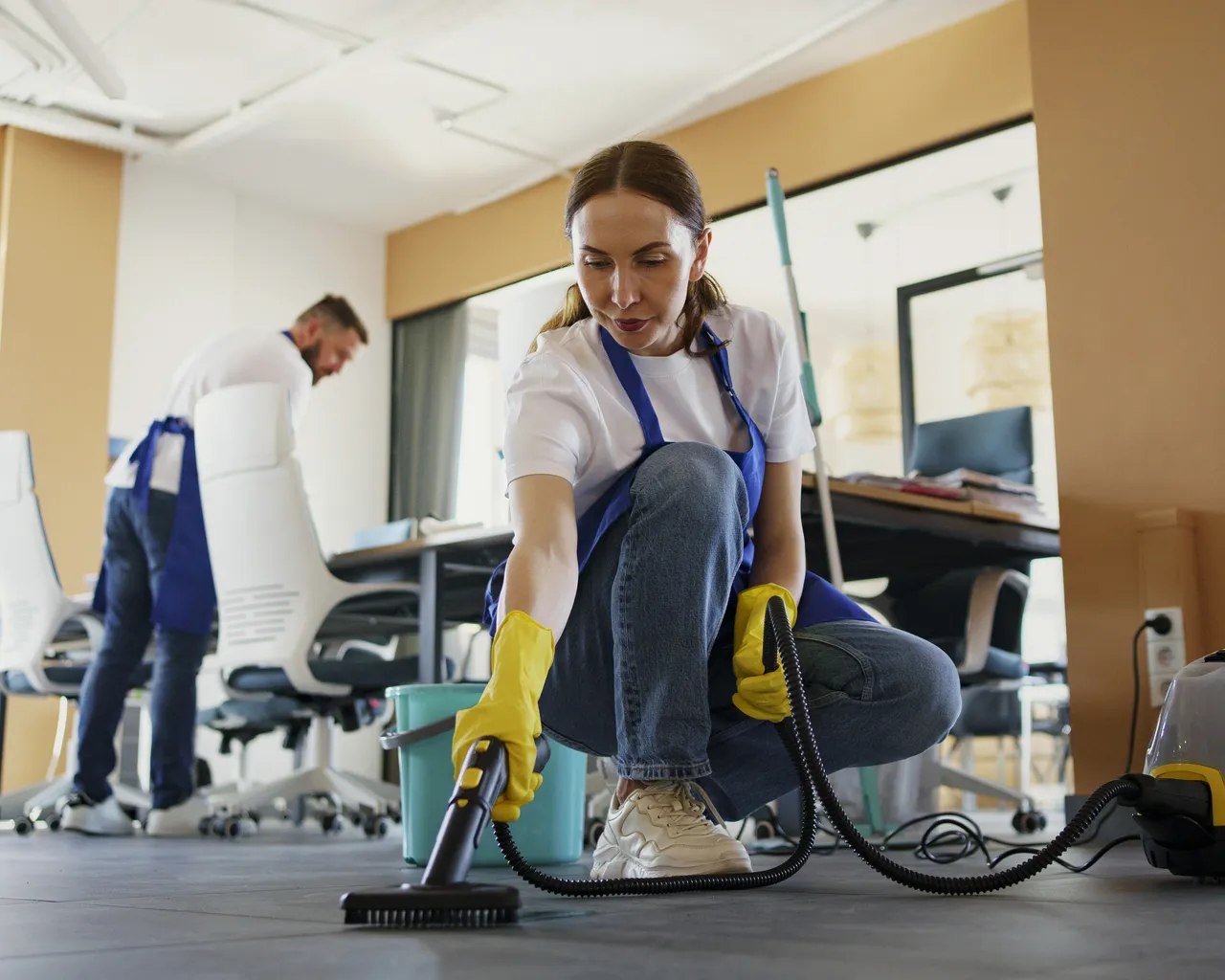 Cleaning Service Person Using Vacuum Cleaner Office